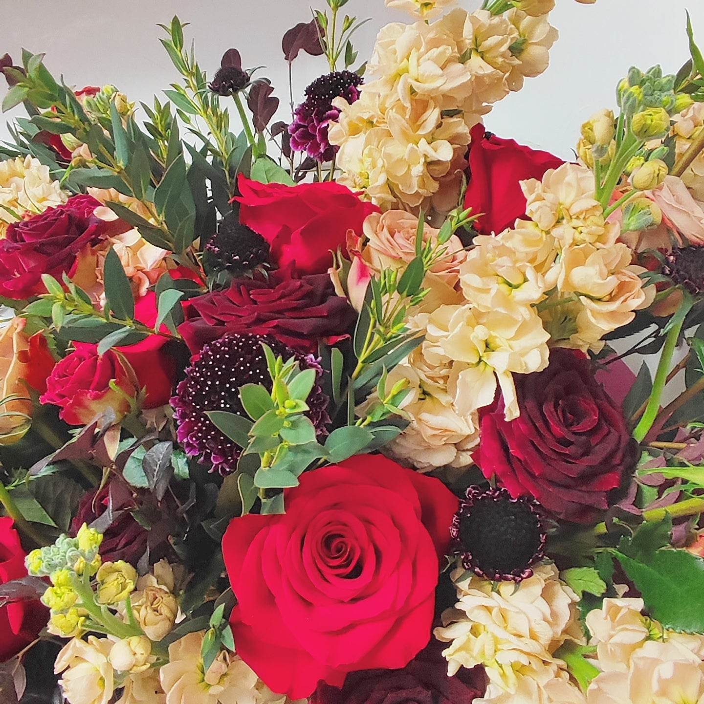 Red rose cappuccino rose champagne violet pointed eucalyptus leaves pine needle grass small rose bouquet -- – F-511 - party X party