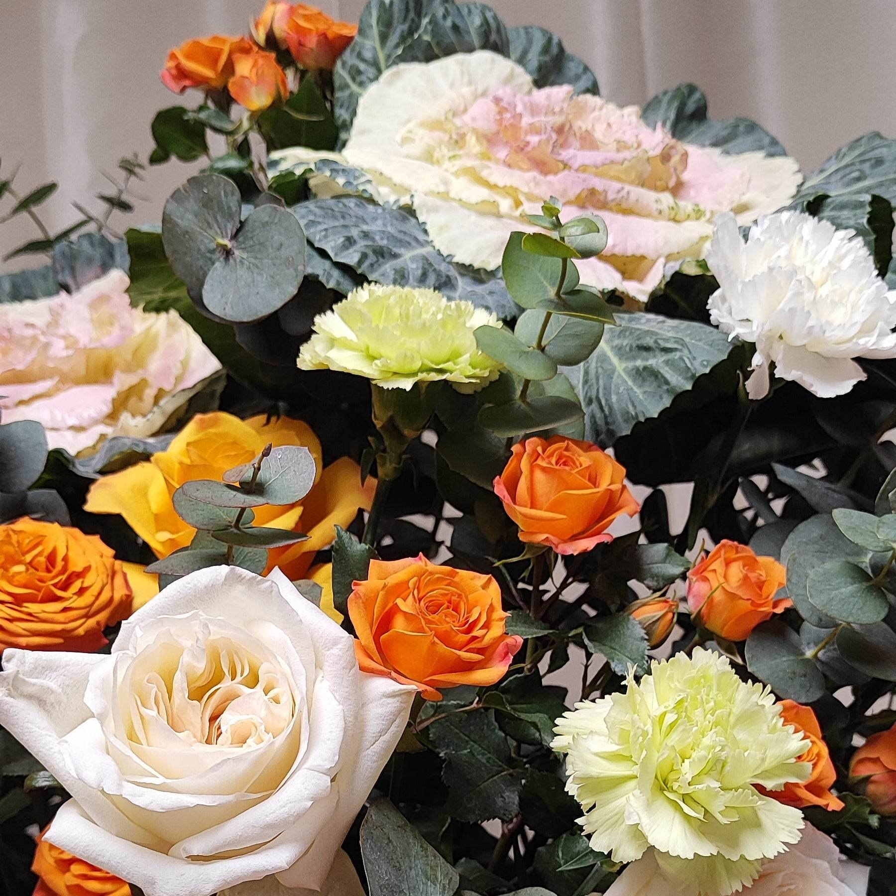 Peony on leaves orange rose white rose small orange rose blue carnation eucalyptus flower basket – --F-513 - party X party