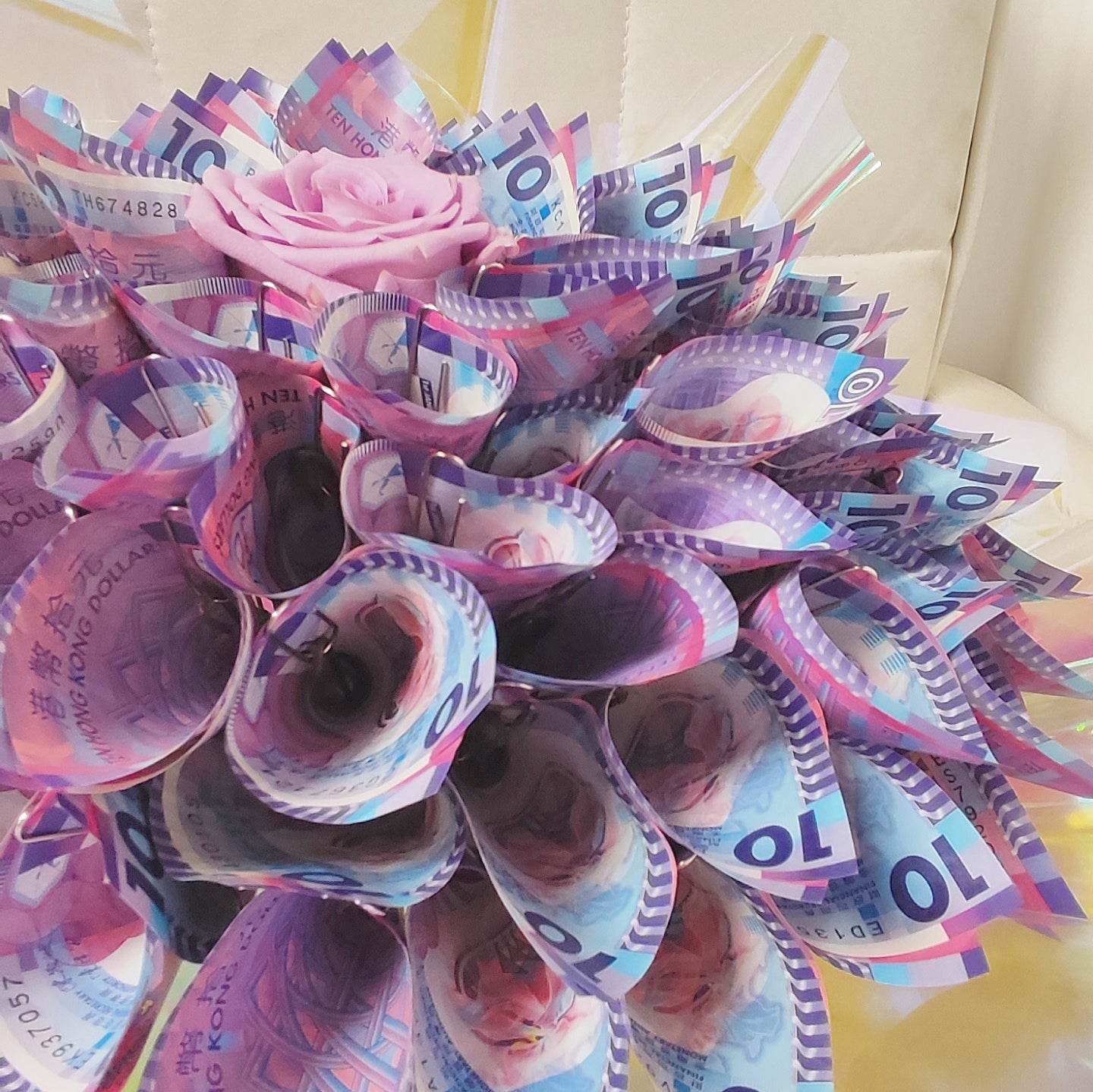 98 pieces of $10 silver paper flowers + 1 purple rose (price includes silver paper)--F-533 - party X party