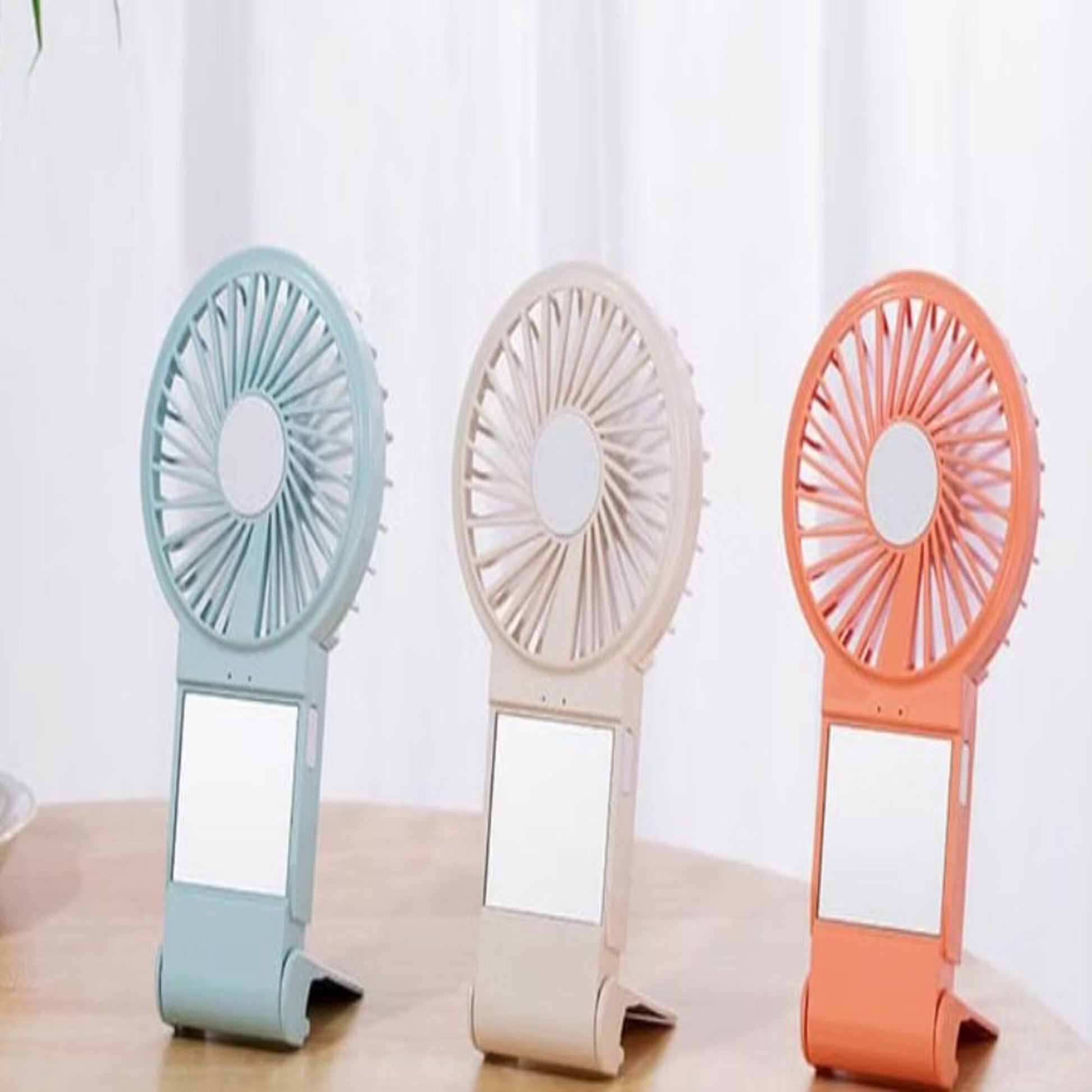 Mini Handheld Fan – Simple Mini Handheld Fan with Makeup Mirror & Phone Stand | HF01 party X party